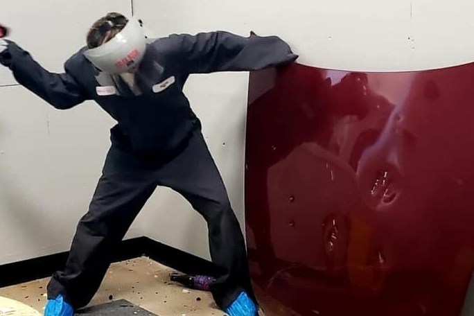 a man holding a sign