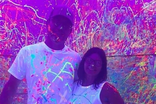 a man standing in front of a stage