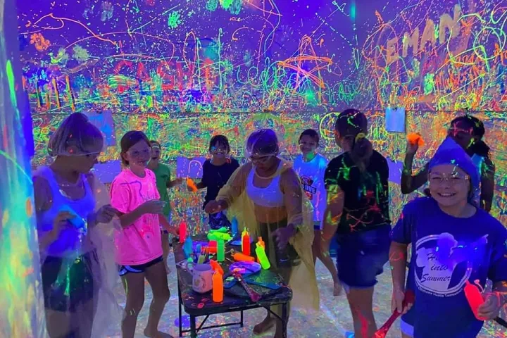 a group of people standing on a stage