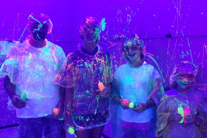 a group of people standing on a stage