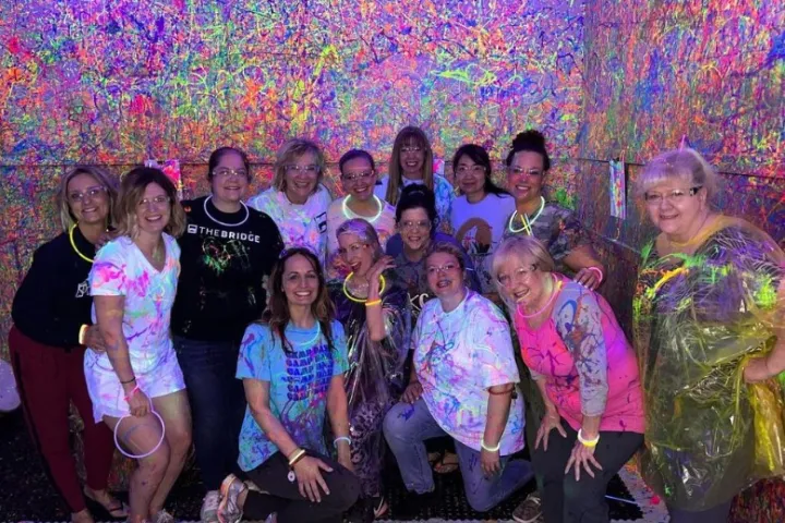 Leslie Rutledge et al. posing for a photo