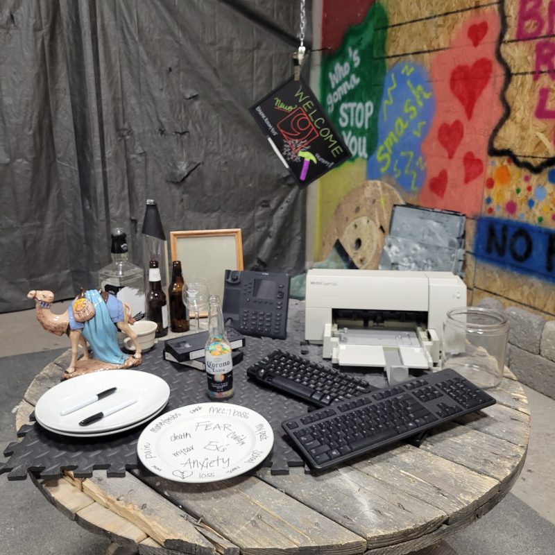 a variety of glass and electronic items to smash in the rage room