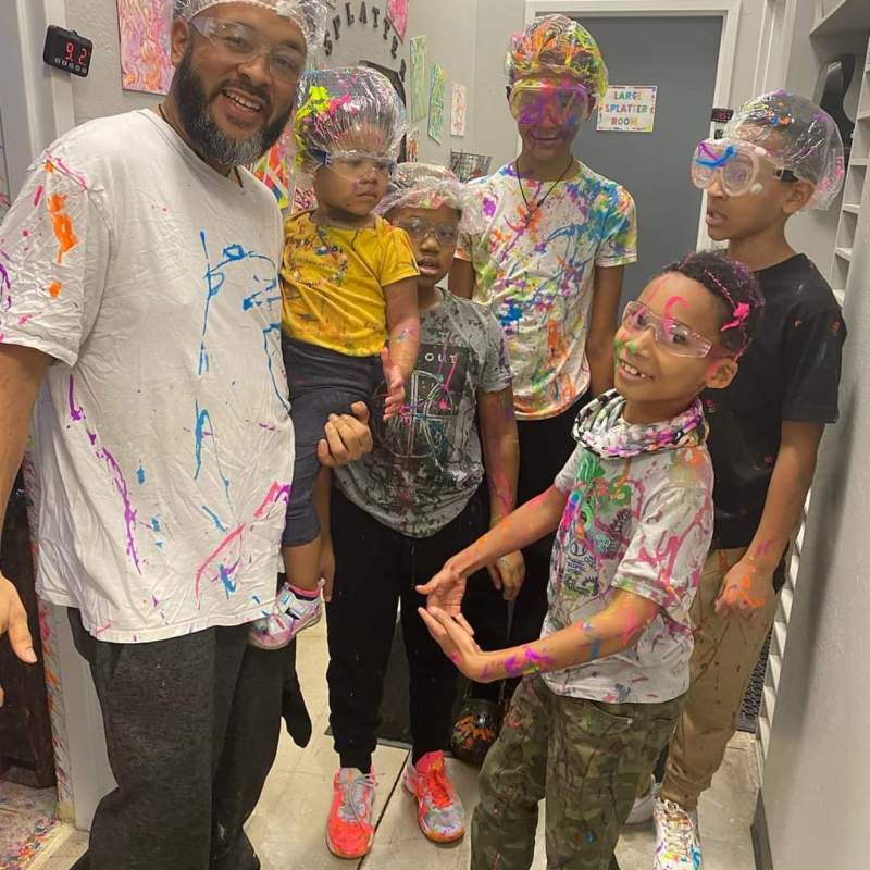a family who just finished their splatter room session at chaos factory